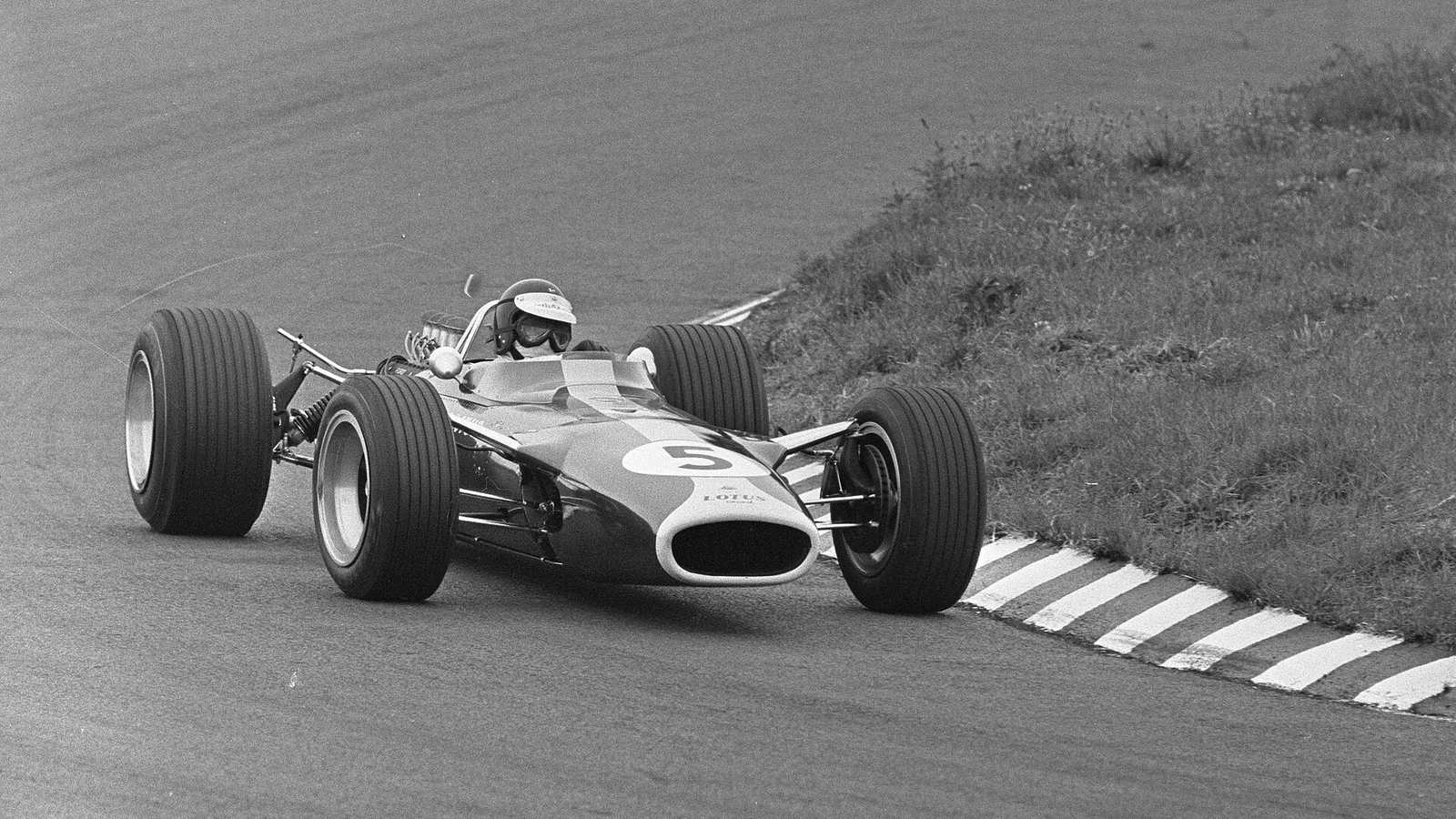 Jim Clark driving the Lotus 49, number 5, at the 1967 Dutch Grand Prix at Zandvoort