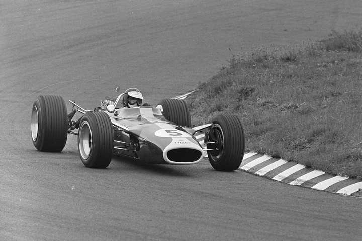 Jim Clark driving the Lotus 49, number 5, at the 1967 Dutch Grand Prix at Zandvoort