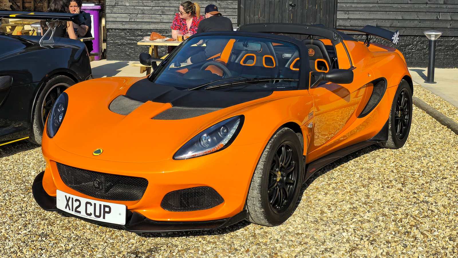 An orange Lotus Elise Cup 250 Series 3