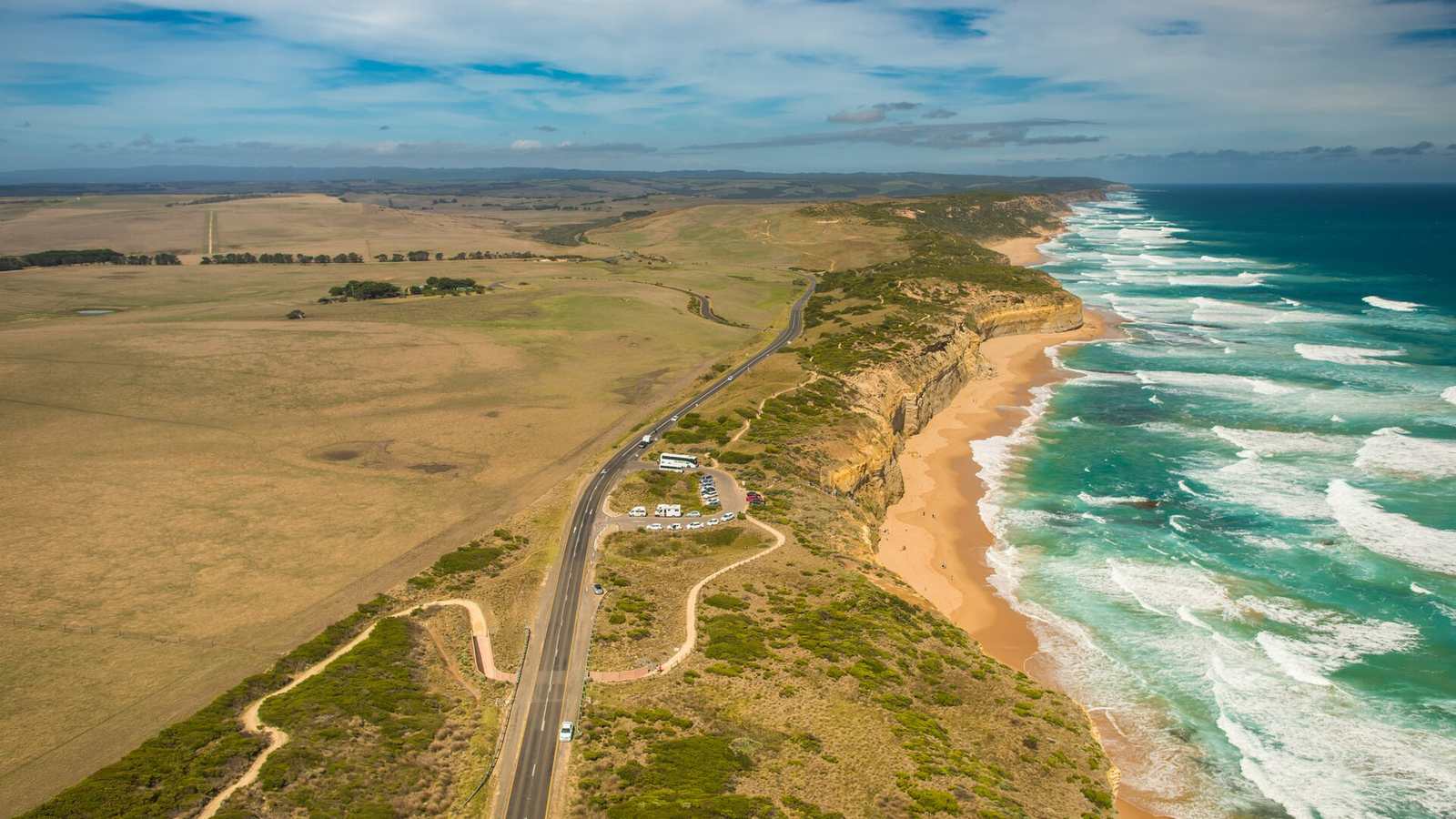 The Great Ocean Road running beside the surf on the Victorian coast