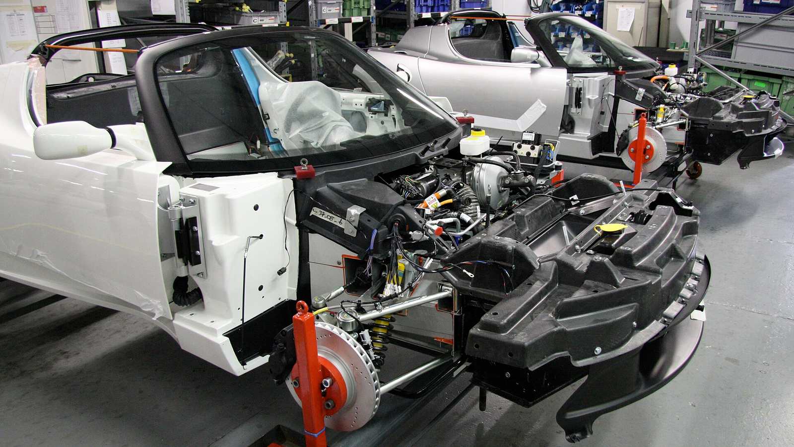 Rolling chassis at an inspection point on the assembly line at the Lotus factory in Hethel