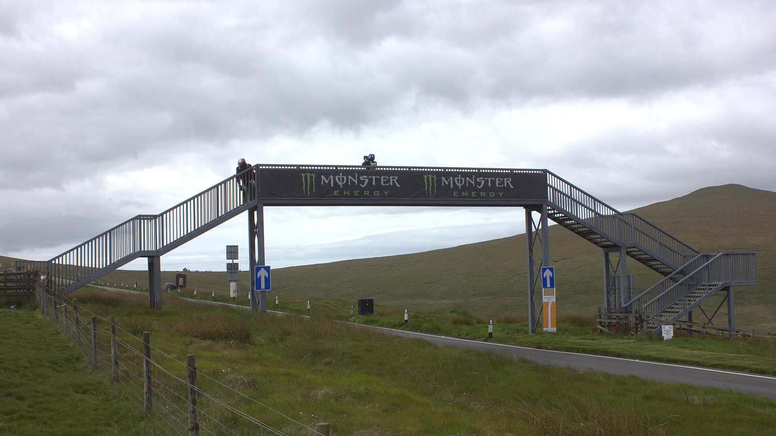 The A18 Mountain Road passing under the footbridge at the Bungalow on the TT course