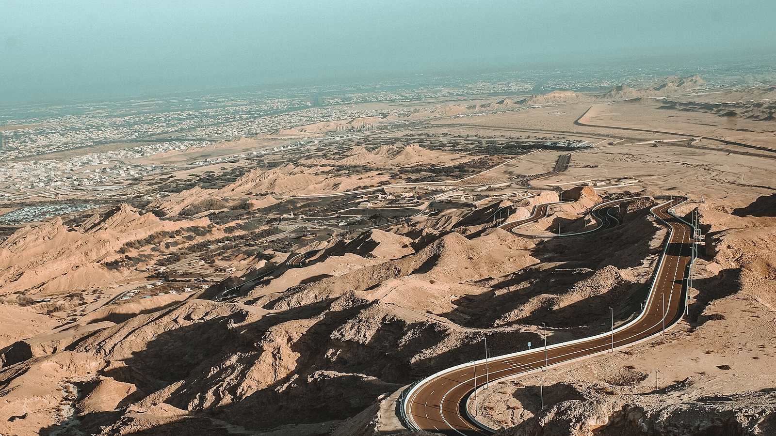 Jebel Hafeet Mountain Road winding up bare desert rock near Al Ain